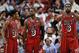 Feb 26, 2013; Miami, FL, USA; Miami Heat point guard Norris Cole (left) , shooting guard Dwyane Wade (center) and small forward LeBron James (right) talk during a timeout in the second half against the Sacramento Kings at the American Airlines Arena. The Heat won in a double overtime 141-129. Mandatory Credit: Steve Mitchell-USA TODAY Sports