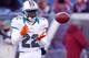 FOXBORO, MA - DECEMBER 30: Reggie Bush #22 of the Miami Dolphins catches a pass before a game with the New England Patriots at Gillette Stadium on December 30, 2012 in Foxboro, Massachusetts. (Photo by Jim Rogash/Getty Images)