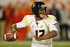 MIAMI GARDENS, FL - JANUARY 04: Geno Smith #12 of the West Virginia Mountaineers throws a pass against the Clemson Tigers during the Discover Orange Bowl at Sun Life Stadium on January 4, 2012 in Miami Gardens, Florida. (Photo by Streeter Lecka/Getty Images)