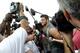 CORTLAND, NY - JULY 27: Tim Tebow #15 of the New York Jets talks to reporters at Jets Training Camp at SUNY Cortland on July 27, 2012 in Cortland, New York. (Photo by Jeff Zelevansky/Getty Images)