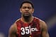 Feb 25, 2013; Indianapolis, IN, USA; Texas A&M Aggies defensive lineman Damontre Moore watches others run the 40 yard dash after he pulled up during the NFL Combine at Lucas Oil Stadium. Mandatory Credit: Brian Spurlock-USA TODAY Sports