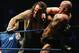 SYDNEY, AUSTRALIA - JUNE 15: The Undertaker (L) pushes Bam Neely into the corner during WWE Smackdown at Acer Arena on June 15, 2008 in Sydney, Australia. (Photo by Gaye Gerard/Getty Images)
