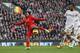 LIVERPOOL, ENGLAND - FEBRUARY 17: Daniel Sturridge of Liverpool shoots at goal during the Barclays Premier League match between Liverpool and Swansea City at Anfield on February 17, 2013 in Liverpool, England. (Photo by Clive Brunskill/Getty Images)