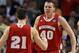 BOSTON, MA - MARCH 22: Jared Berggren #40 of the Wisconsin Badgers celebrates with teammate Josh Gasser #21 after scoring against the Syracuse Orange during their 2012 NCAA Men's Basketball East Regional Semifinal game at TD Garden on March 22, 2012 in Boston, Massachusetts. (Photo by Elsa/Getty Images)