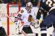 Ray Emery combined with Corey Crawford to shut out the St. Louis Blues. Crawford left the game after one period Thursday.