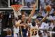 May 13, 2012; Miami, FL, USA; Miami Heat point guard Mario Chalmers (15) drives to the basket as Indiana Pacers center Louis Amundson (17) defends during the second half in game one of the Eastern Conference semifinals of the 2012 NBA Playoffs at American Airlines Arena. Miami won 95-86. Mandatory Credit: Steve Mitchell-USA TODAY Sports