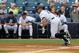 February 24, 2013; Tampa, FL, USA; New York Yankees left fielder Brett Gardner (11) hits a single during the first inning against the Toronto Blue Jays at George M. Steinbrenner Field. Mandatory Credit: Kim Klement-USA TODAY Sports