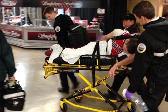 Drunk Blazers Fan Goes YOLO & Gets Stretchered During First Quarter