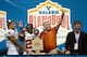Dec 29, 2012; San Antonio, TX, USA; Texas Longhorns head coach Mack Brown (right) and safety Kenny Vaccaro (4) and running back D.J. Monroe (center) react after defeating the Oregon State Beavers in the Alamo Bowl at the Alamodome. Texas beat Oregon State 31-27. Mandatory Credit: Brendan Maloney-USA TODAY Sports