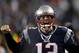 Jan 20, 2013; Foxboro, MA, USA; New England Patriots quarterback Tom Brady (12) screams before the AFC championship game against the Baltimore Ravens at Gillette Stadium. Mandatory Credit: Greg M. Cooper-USA TODAY Sports