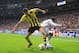 MADRID, SPAIN - NOVEMBER 06: Robert Lewandowski of Borussia Dortmund (L) battles for the ball against Raphael Verane of Real Madrid during the UEFA Champions League Group D match between Real Madrid and Borussia Dortmund at Estadio Santiago Bernabeu on November 6, 2012 in Madrid, Spain. (Photo by Denis Doyle/Getty Images)
