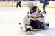 VANCOUVER, BC - JUNE 15: Tim Thomas #30 of the Boston Bruins makes a save against the Vancouver Canucks during Game Seven of the 2011 NHL Stanley Cup Final at Rogers Arena on June 15, 2011 in Vancouver, British Columbia, Canada. (Photo by Harry How/Getty Images)