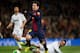 BARCELONA, SPAIN - FEBRUARY 26: Gonzalo Higuain (R) of Real Madrid fails to stop Lionel Messi of Barcelona during the Copa del Rey semi final second leg match between FC Barcelona and Real Madrid CF at the Camp Nou on February 26, 2013 in Barcelona, Spain. (Photo by Jasper Juinen/Getty Images)