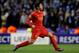 LIVERPOOL, ENGLAND - FEBRUARY 21: Luis Suarez of Liverpool celebrates after scoring his team's third goal from a free kick during the UEFA Europa League round of 32 second leg match between Liverpool FC and FC Zenit St Petersburg at Anfield on February 21, 2013 in Liverpool, England. (Photo by Alex Livesey/Getty Images)