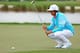 PALM BEACH GARDENS, FL - MARCH 01: Rickie Fowler lines up a putt on the 16th hole during the second round of the Honda Classic at PGA National Resort and Spa on March 1, 2013 in Palm Beach Gardens, Florida. (Photo by Mike Ehrmann/Getty Images)
