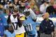 NASHVILLE, TN - OCTOBER 11: Wide receiver Mike Wallace #17 of the Pittsburgh Steelers catches a touchdown pass over the outstretched arms of Jason McCourty #30 of the Tennessee Titans at LP Field on October 11, 2012 in Nashville, Tennessee. (Photo by Frederick Breedon/Getty Images)