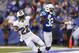 INDIANAPOLIS, IN - NOVEMBER 04: Reggie Bush #22 of the Miami Dolphins gets bumped late after an 18-yard touchdown run by Cassius Vaughn #32 of the Indianapolis Colts during the game at Lucas Oil Stadium on November 4, 2012 in Indianapolis, Indiana. (Photo by Joe Robbins/Getty Images)