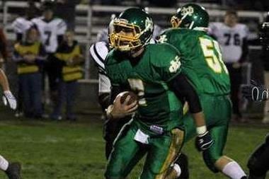 Ohio Pro-Style Quarterback, Chayce Crouch, Throws in Front of Rutgers Staff