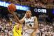 Feb. 12, 2013; East Lansing, MI, USA; Michigan State Spartans center Adreian Payne (5) drives to the basket against Michigan Wolverines forward Mitch McGary (4) during the second half at Jack Breslin Students Events Center. Mandatory Credit: Mike Carter-USA TODAY Sports