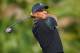 PALM BEACH GARDENS, FL - MARCH 02: Tiger Woods of USA plays a shot during the third round of the Honda Classic on March 2, 2013 in Palm Beach Gardens, Florida. (Photo by Stuart Franklin/Getty Images)