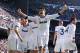 MADRID, SPAIN - MARCH 02: Alvaro Morata (C) of Real Madrid CF celebrates with his teammates after Karim Benzema of Real Madrid CF (L) scored the opening goal during the La Liga match between Real Madrid CF and FC Barcelona at Bernabeu on March 2, 2013 in Madrid, Spain. (Photo by David Ramos/Getty Images)