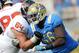 Sept. 22, 2012; Pasadena, CA, USA; Oregon State Beavers offensive tackle Colin Kelly (64) defends UCLA Bruins defensive end Datone Jones (56) in the fourth quarter at the Rose Bowl. Oregon State won 27-20. Mandatory Credit: Jayne Kamin-Oncea-USA TODAY Sports