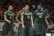 Jan 30, 2013; Blacksburg, VA, USA; Miami Hurricanes guard Trey McKinney Jones (4) guard Shane Larkin (0) and center Reggie Johnson (42) during the game against the Virginia Tech Hokies at Cassell Coliseum. Mandatory Credit: Peter Casey-USA TODAY Sports