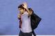 MELBOURNE, AUSTRALIA - JANUARY 25: Roger Federer of Switzerland leaves the court after losing his semifinal match against Andy Murray of Great Britain during day twelve of the 2013 Australian Open at Melbourne Park on January 25, 2013 in Melbourne, Australia. (Photo by Michael Dodge/Getty Images)