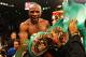 LAS VEGAS, NV - MAY 05: Floyd Mayweather Jr. celebrates after defeating Miguel Cotto by unanimous decision during their WBA super welterweight title fight at the MGM Grand Garden Arena on May 5, 2012 in Las Vegas, Nevada. (Photo by Al Bello/Getty Images)