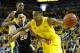 March 3, 2013; Ann Arbor, MI, USA; Michigan Wolverines guard Trey Burke (3) moves the ball on Michigan State Spartans guard Travis Trice (20) in the first half at Crisler Center. Mandatory Credit: Rick Osentoski-USA TODAY Sports