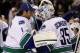 BOSTON, MA - JANUARY 07: Roberto Luongo #1 congratulates Cory Schneider #35 of the Vancouver Canucks after the win over the Boston Bruins on January 7, 2012 at TD Garden in Boston, Massachusetts. The Vancouver Canucks defeated the Boston Bruins 4-3. (Photo by Elsa/Getty Images)