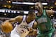 Dec 07, 2012; Philadelphia, PA, USA; Philadelphia 76ers forward Thaddeus Young (21) is defended by Boston Celtics forward Jeff Green (8) during the fourth quarter at the Wachovia Center. The Sixers defeated the Celtics 95-94 in overtime. Mandatory Credit: Howard Smith-USA TODAY Sports