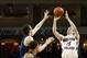 Mar 3, 2013; Chestnut Hill, MA, USA; Boston College Eagles guard Joe Rahon (25) hits a three-point basket to defeat the Virginia Cavaliers at Silvio O. Conte Forum. Mandatory Credit: Mark L. Baer-USA TODAY Sports