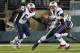 EAST RUTHERFORD, NJ - NOVEMBER 22: Muhammad Wilkerson #96 of the New York Jets sacks quarterback Tom Brady #12 of the New England Patriots as lineman Donald Thomas #64 looks on during a game at MetLife Stadium on November 22, 2012 in East Rutherford, New Jersey. (Photo by Rich Schultz /Getty Images)