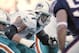 FOXBORO, MA - DECEMBER 24: Jake Long #77 of the Miami Dolphins during the second quarter against the New England Patriots at Gillette Stadium on December 24, 2011 in Foxboro, Massachusetts. (Photo by Winslow Townson/Getty Images)
