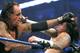 CM Punk and The Undertaker facing off in 2009 (Image Obtained From WWE.com)