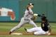 PITTSBURGH, PA - AUGUST 27: Rafael Furcal #15 of the St. Louis Cardinals makes a throw to first base against the Pittsburgh Pirates during the game on August 27, 2012 at PNC Park in Pittsburgh, Pennsylvania. The Cardinals defeated the Pirates 4-3. (Photo by Justin K. Aller/Getty Images)