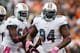CINCINNATI, OH - OCTOBER 07: Defensive tackle Randy Starks #94 of the Miami Dolphins celebrates after an interception with Karlos Dansby #58 against the Cincinnati Bengals at Paul Brown Stadium on October 7, 2012 in Cincinnati, Ohio. (Photo by Matt Sullivan/Getty Images)