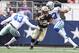 Dec 23, 2012; Arlington, TX, USA; New Orleans Saints running back Darren Sproles (43) runs the ball against the Dallas Cowboys safety Gerald Sensabaugh (43) and linebacker Anthony Spencer (93) at Cowboys Stadium. The Saints beat the Cowboys 34-31 in overtime. Mandatory Credit: Tim Heitman-USA TODAY Sports