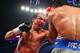 LAS VEGAS, NV - DECEMBER 08: (L-R) Juan Manuel Marquez throws a left at Manny Pacquiao during their welterweight bout at the MGM Grand Garden Arena on December 8, 2012 in Las Vegas, Nevada. (Photo by Al Bello/Getty Images)