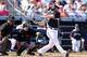 PEORIA, AZ - MARCH 04: Raul Ibanez #28 of the Seattle Mariners hits a solo home run against the Colorado Rockies during the third inning of the spring training game at Peoria Stadium on March 4, 2013 in Peoria, Arizona. (Photo by Christian Petersen/Getty Images)