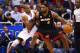 Dec 31, 2012; Orlando, FL, USA; Miami Heat small forward LeBron James (6) attempts to drive around Orlando Magic shooting guard Arron Afflalo (4) during overtime at Amway Center. Miami defeated Orlando 112-110 in overtime. Mandatory Credit: Douglas Jones-USA TODAY Sports