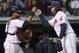 CLEVELAND, OH - SEPTEMBER 28: Catcher Carlos Santana #41 of the Cleveland Indians celebrates with closer Chris Perez #54 after the Indians defeated the Kansas City Royals at Progressive Field on September 28, 2012 in Cleveland, Ohio. The Indians defeated the Royals 8-5. (Photo by Jason Miller/Getty Images)