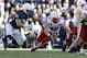 STATE COLLEGE, PA - NOVEMBER 12: Tyler Legate #48 of the Nebraska Cornhuskers fumbles the ball against the Penn State Nittany Lions during the game on November 12, 2011 at Beaver Stadium in State College, Pennsylvania. Nebraska won 17-14. (Photo by Justin K. Aller/Getty Images)