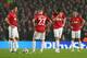 MANCHESTER, ENGLAND - MARCH 05: The Manchester United players look dejected after conceding a second goal during the UEFA Champions League Round of 16 Second leg match between Manchester United and Real Madrid at Old Trafford on March 5, 2013 in Manchester, United Kingdom. (Photo by Alex Livesey/Getty Images)