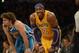 Jan 29, 2013; Los Angeles, CA, USA; Los Angeles Lakers center Dwight Howard (12) smiles next to New Orleans Hornets center Robin Lopez (15) during the game at Staples Center. Mandatory Credit: Richard Mackson-USA TODAY Sports