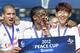 SUWON, SOUTH KOREA - JULY 22: Son Heung-Min (R) of Hamburger holds the trophy as he celebrates with team-mates Jeffrey Bruma (L) and Michael Mancienne after winning the Peace Cup final match between Seongnam Ilhwa Chunma and Hamburger SV at Suwon World Cup Stadium on July 22, 2012 in Suwon, South Korea. (Photo by Kiyoshi Ota/Getty Images)