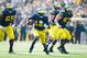November 10, 2012; Ann Arbor, MI, USA; Michigan Wolverines quarterback Devin Gardner (12) runs the ball against the Northwestern Wildcats at Michigan Stadium. Mandatory Credit: Rick Osentoski-USA TODAY Sports