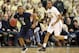 March 3, 2013; Pittsburgh, PA, USA; Villanova Wildcats guard Tony Chennault (5) brings the ball up court while keeping an eye on Pittsburgh Panthers forward Durand Johnson (5) during the second half at the Petersen Events Center. The Pittsburgh Panthers won 73-64. Mandatory Credit: Charles LeClaire-USA TODAY Sports