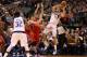 Jan 16, 2013; Dallas, TX, USA; Dallas Mavericks forward Dirk Nowitzki (41) passes the ball against the Houston Rockets at the American Airlines Center. The Mavs beat the Rockets 105-100. Mandatory Credit: Matthew Emmons-USA TODAY Sports